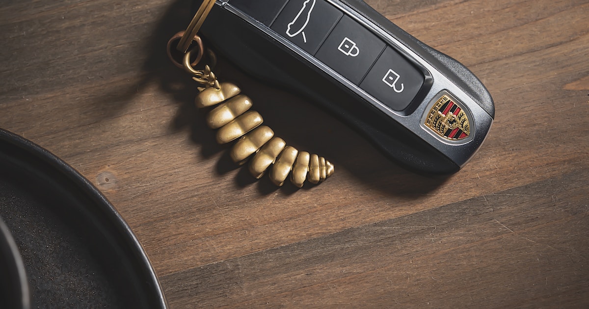 Documents and car keys on a desk ready for car rental in Singapore